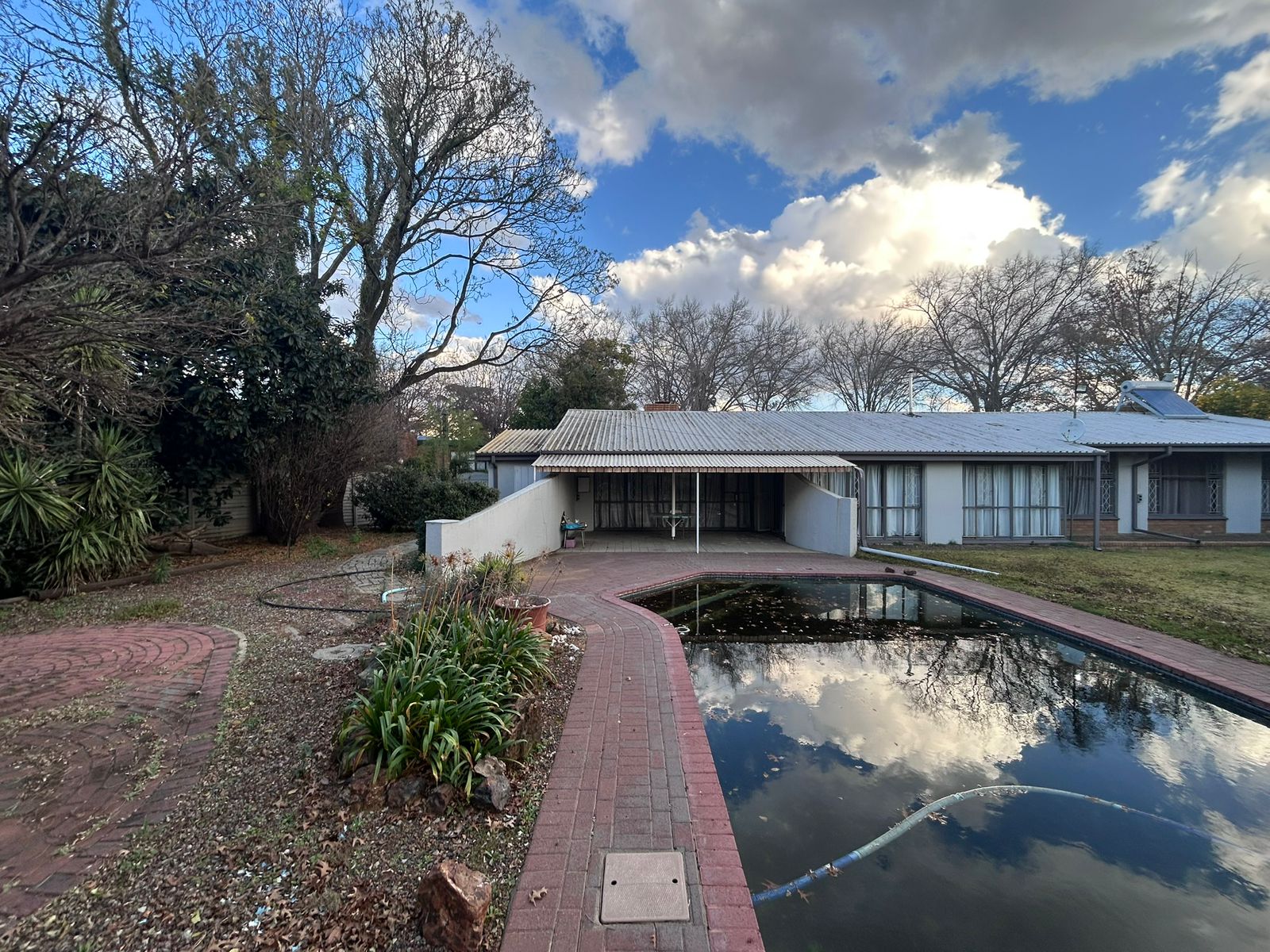Pool and House